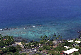 An aerial view of Kahalu‘u Bay. One out of every three visitors to Hawai‘i Island visits the bay, making it the second-most popular tourist destination on the island.