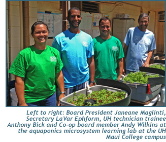 Board President Janeane Maglinti, Secretary LaVar Ephform, UH technician trainee Anthony Bick and Co-op board member Andy Wilkins at the aquaponics microsystem learning lab at the UH Maui College campus