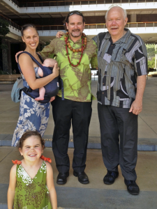 Beamer (center) poses with his wife Laua‘e, their children, and father Kapono at the State Capitol following his confirmation to serve on the Hawai‘i Commission of Water Resource Management in 2013.