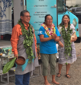 The new vehicle was blessed by Danny Akaka (left) and his wife Anna. KBEC director Cindi Punihaole (center) led the successful fundraising effort to secure the new center.