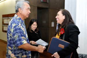 Lupenui, Hawai‘i Board of Education member from 2011 to 2015, meeting the late State Sen. Gilbert Kahele (Photo by Ed Morita)